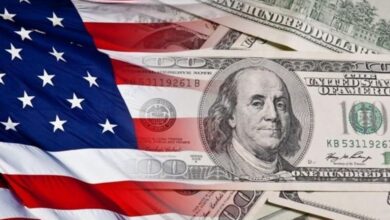 ارتفاع الدولار عقب تذبذب الأسواق إثر خفض الفائدة الأمريكية